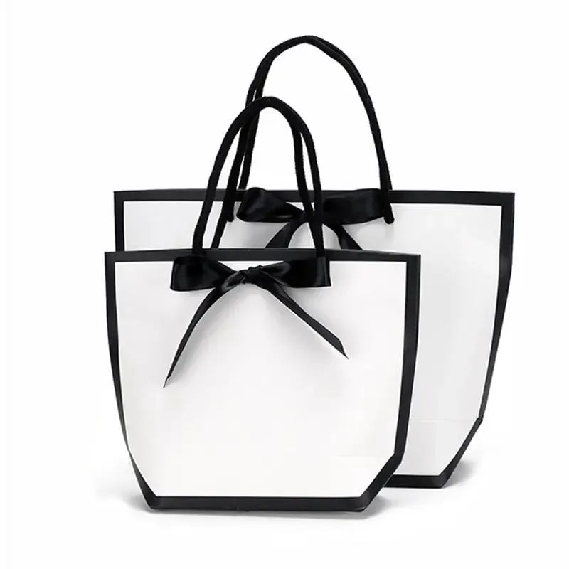 Customized Wholesale White Cardboard Paper Bag Black Ribbon Shopping Bag Lunch Handbag Lunch Box Food Grade Material Gift Bag - Buy High End Gift Jewelry Shopping Bag,Customized Wholesale Fashion Minimalist Gift Bags,Bow Decorated Cute Mini Shopping Bag.