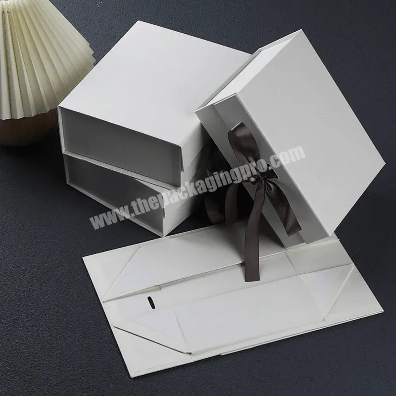 Custom Luxury Cardboard Box Clothing Packaging Magnetic Foldable Rigid Gift Box For Clothes T-shirt Shoes - Buy Custom Made Cardboard Boxes For Shirts,Magnetic Gift Box Cajas De Regalo Cajas De Carton,Luxury White Magnetic Gift Box With Ribbon Closure.